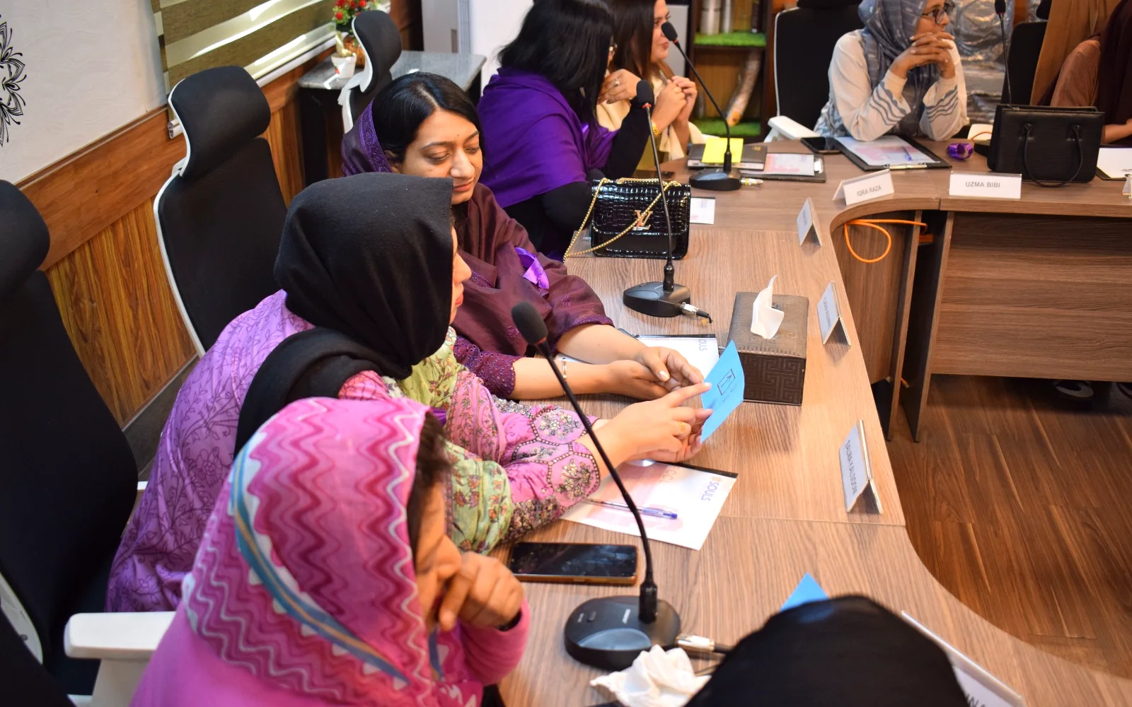 A SOULS facilitator leading a live corporate training session for an engaged audience